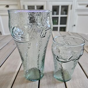 Vintage two Coca-Cola glasses textured green glass featuring the Coca-Cola logo.